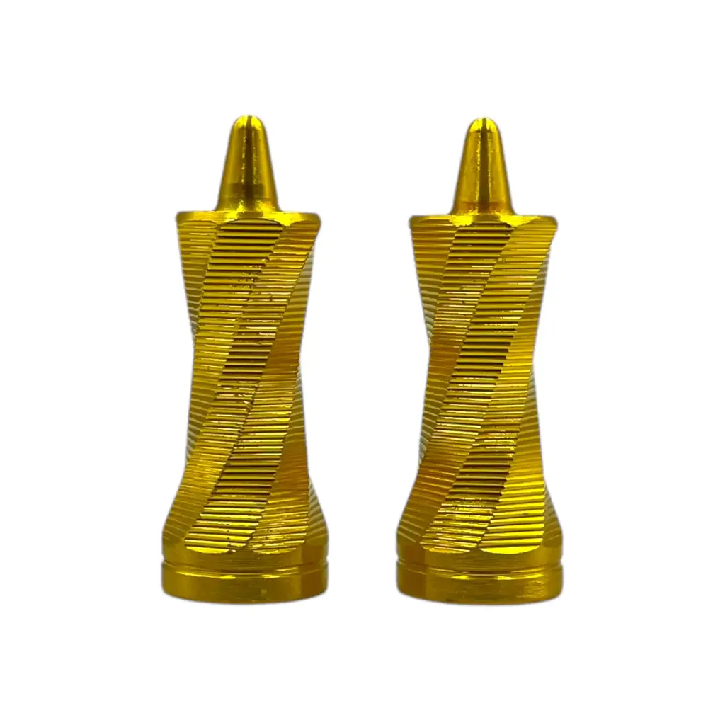Tapón para válvula en forma de espiral dorado